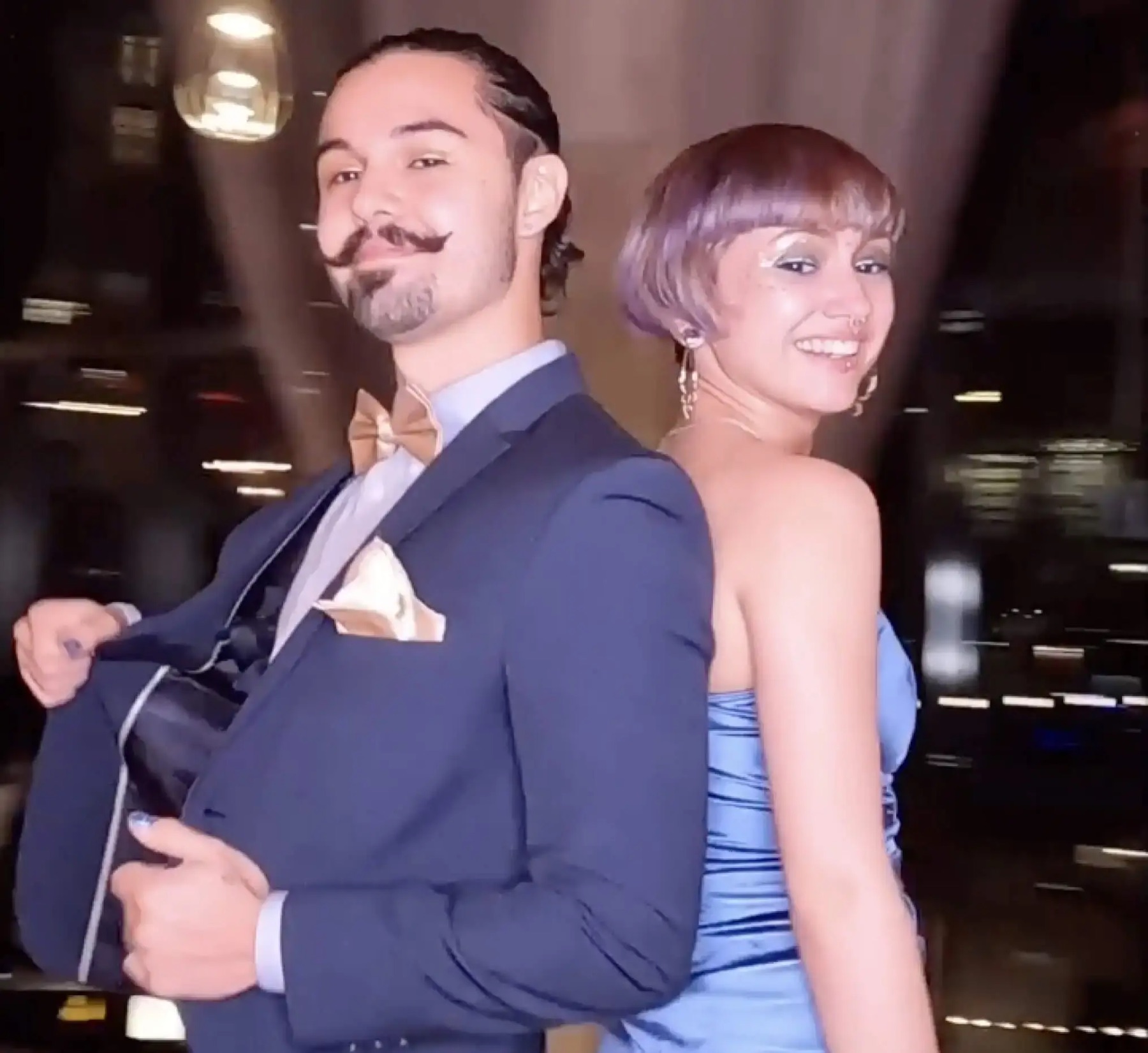 Guests posing at a photo booth